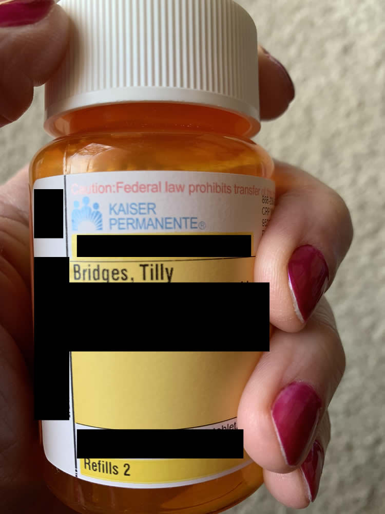 a pill bottle with all info redacted except for Bridges, Tilly