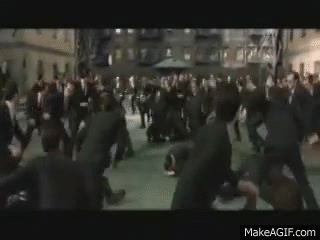 animated gif of the burly brawl with Neo fighting dozens and dozens of Smiths from Matrix Reloaded