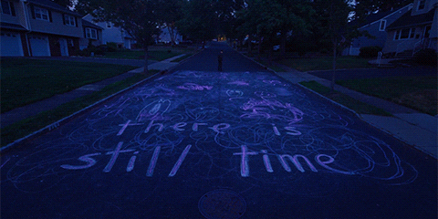 animated gif of the chalk drawing that says "there is still time" from I Saw the TV Glow