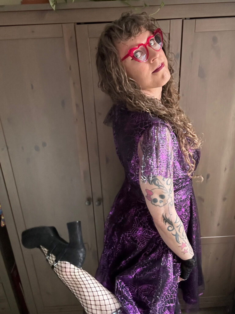 Me trying to show off my new heels that have skull buckles but you can’t really tell.