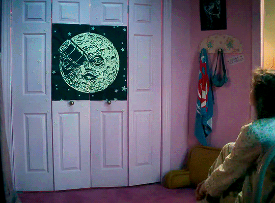 the creature coming out of lisa's closet, wearing a pink satin robe, from lisa frankenstein