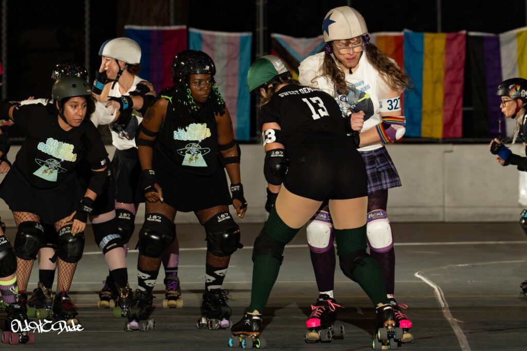 me getting hit by a blocker in a derby bout while I'm jamming