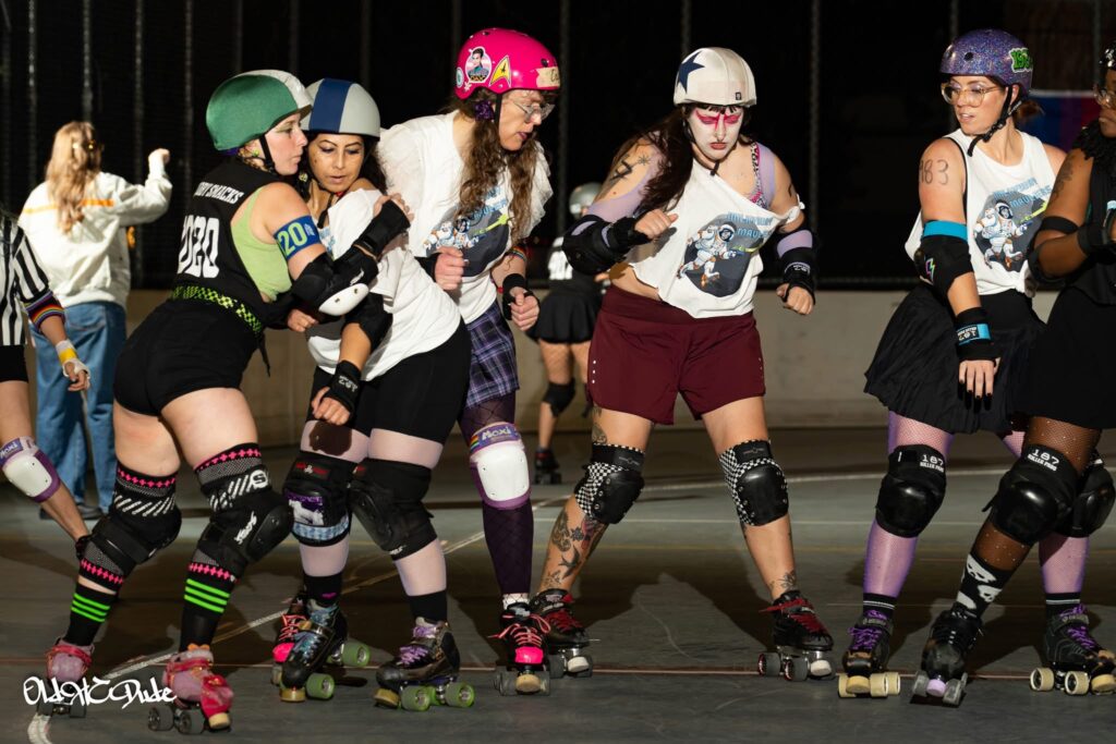 me blocking for my team's jammer in a derby bout