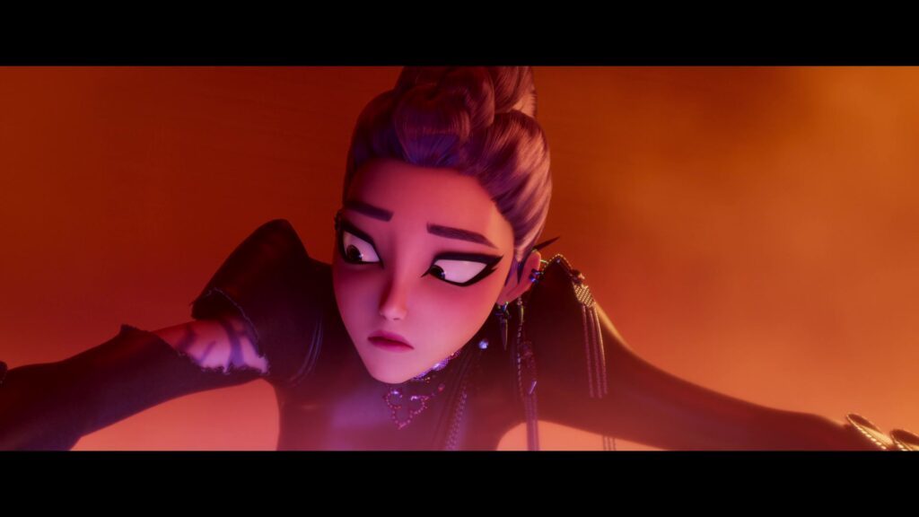 Rumi looking at her arm, where her costume is ripped and her demon patterns are visible
