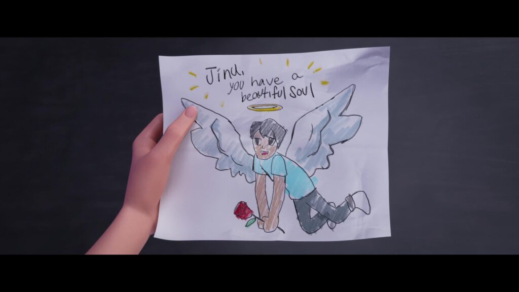 a child's drawing of Jinu as an angel with wings and a halo, that says "Jinu you have a beautiful soul"
