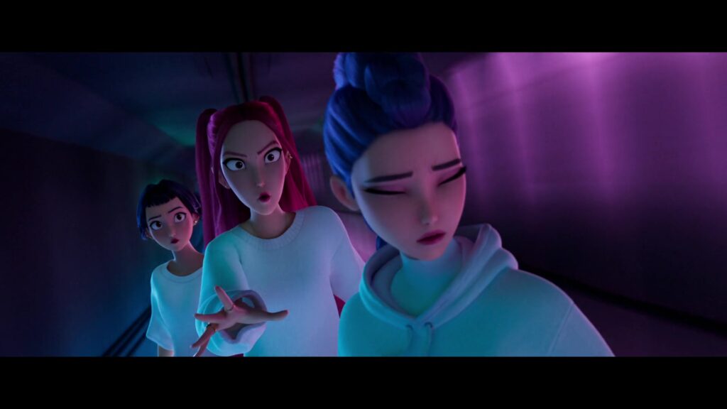 Zoey looking on as Mira talks to Rumi, who's turned away and closed her eyes