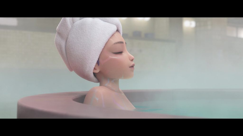 Rumi, towel on her head and visible demon patterns on her shoulders, neck, and face, in a hot tub in a bath house